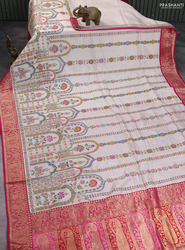 Crepe silk saree cream and pink with allover prints & pita embroidery work and zari woven border
