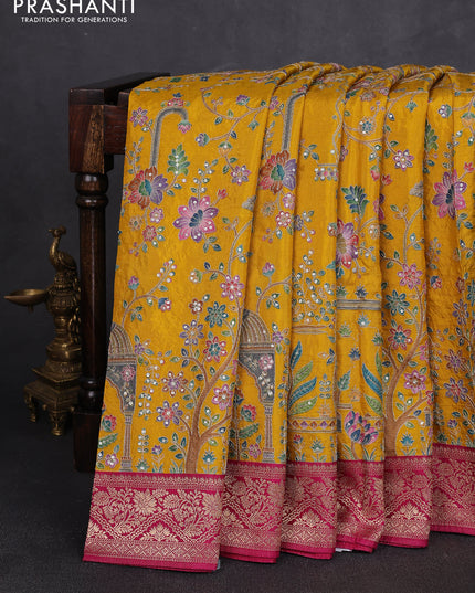 Crepe silk saree mustard yellow and pink with allover prints & pita embroidery work and zari woven border