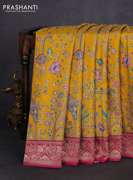Crepe silk saree mustard yellow and pink with allover prints & pita embroidery work and zari woven border