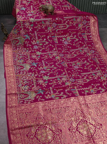 Crepe silk saree pink with allover prints & pita embroidery work and zari woven border