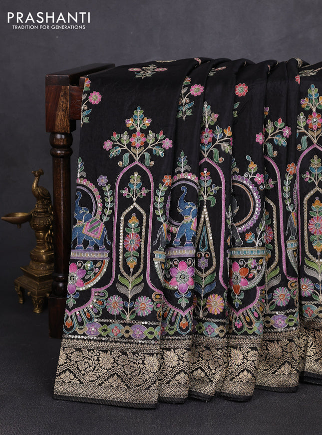 Crepe silk saree black with allover prints & pita embroidery work and zari woven border