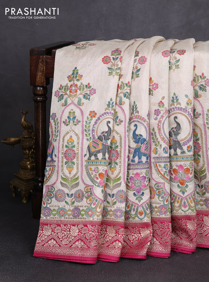 Crepe silk saree cream and dark pink with allover prints & pita embroidery work and zari woven border