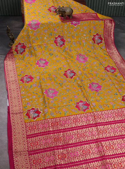 Crepe silk saree mustard yellow with allover prints & pita embroidery work and zari woven border