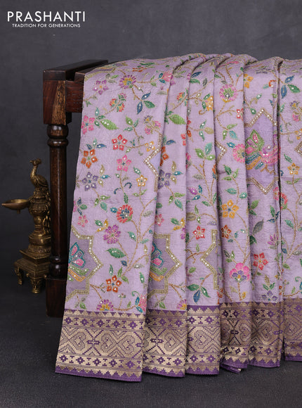 Crepe silk saree pastel purple and purple shade with allover prints & pita embroidery work and zari woven border