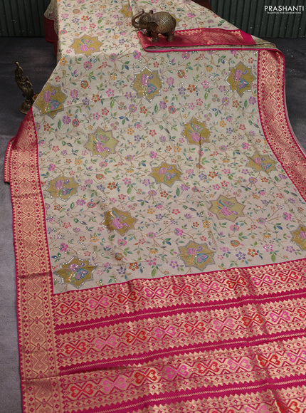 Crepe silk saree sandal and pink with allover prints & pita embroidery work and zari woven border