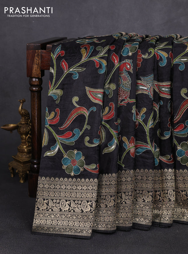 Crepe silk saree black with allover prints & pita embroidery work and zari woven border