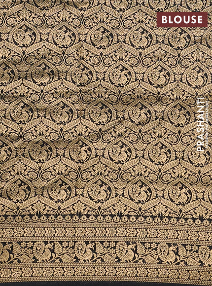 Crepe silk saree black with allover prints & pita embroidery work and zari woven border