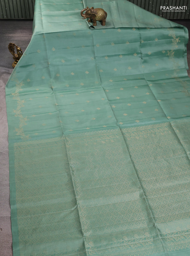 Pure soft silk saree pastel green with allover zari woven buttas and zari woven border