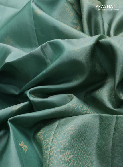 Pure soft silk saree pastel green with allover zari woven buttas and zari woven border
