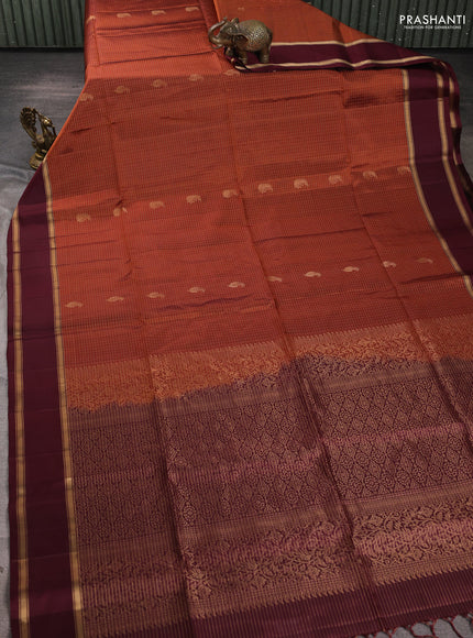 Pure soft silk saree rust shade and deep maroon with allover small zari checks & buttas and rettapet zari woven border