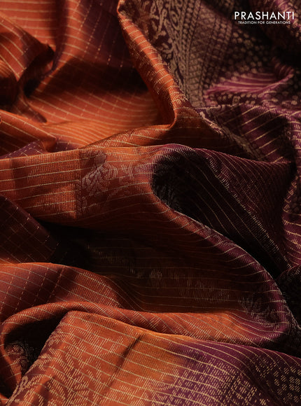 Pure soft silk saree rust shade and deep maroon with allover small zari checks & buttas and rettapet zari woven border