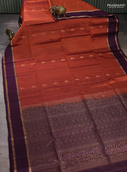 Pure soft silk saree rust shade and deep purple with allover small zari checks & buttas and rettapet zari woven border