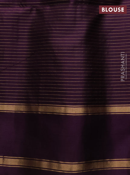 Pure soft silk saree rust shade and deep purple with allover small zari checks & buttas and rettapet zari woven border