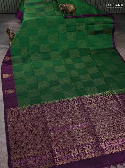Pure soft silk saree green and purple with allover zari woven butttas and zari woven butta border