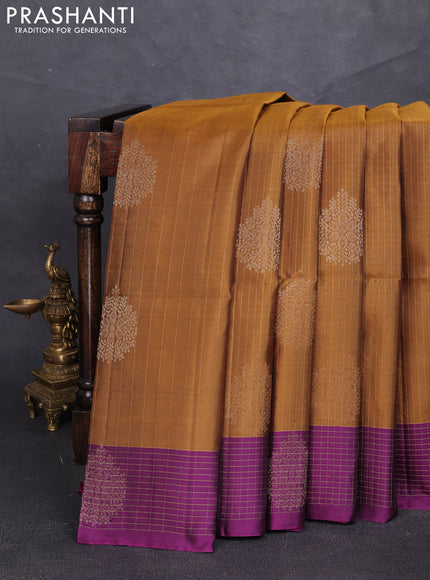 Pure soft silk saree dark mustard and purple with allover zari strieps & buttas and zari woven checked border