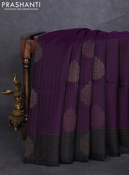Pure soft silk saree purple and black with allover zari strieps & buttas and zari woven checked border