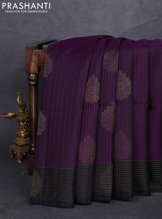 Pure soft silk saree purple and black with allover zari strieps & buttas and zari woven checked border