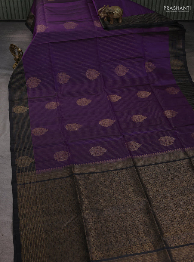 Pure soft silk saree purple and black with allover zari strieps & buttas and zari woven checked border