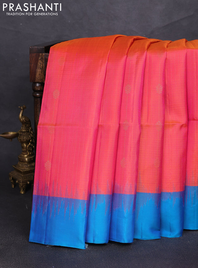Pure soft silk saree dual shade of pinkish orange and cs blue with allover zari weaves & buttas and simple border