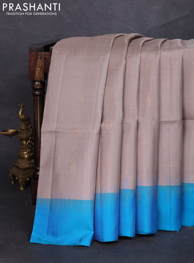Pure soft silk saree grey and cs blue with allover zari weaves & buttas and simple border