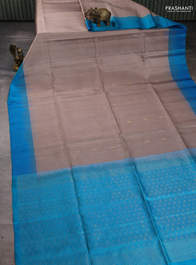 Pure soft silk saree grey and cs blue with allover zari weaves & buttas and simple border