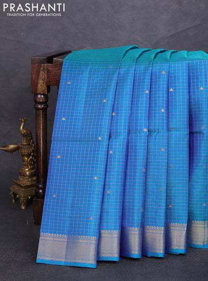 Pure soft silk saree dual shade of bluish green with allover zari checks & buttas and zari woven border