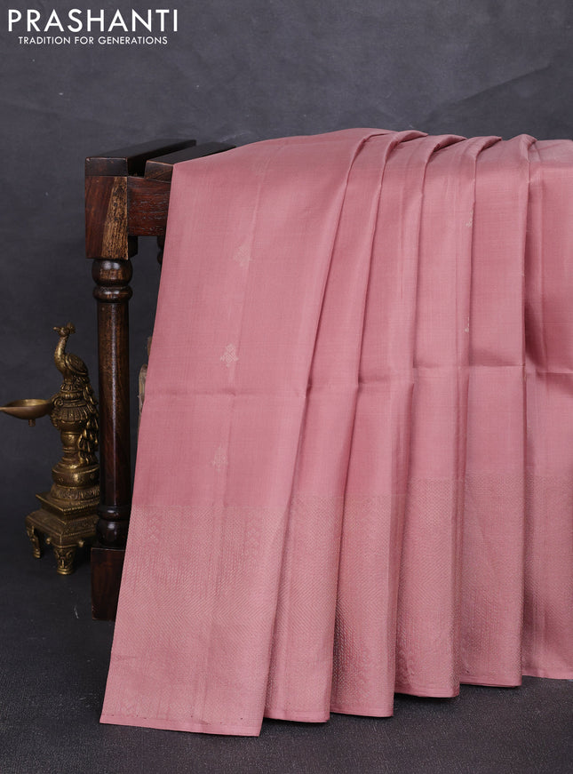 Pure soft silk saree pastel peach with zari woven buttas and rich zari woven border
