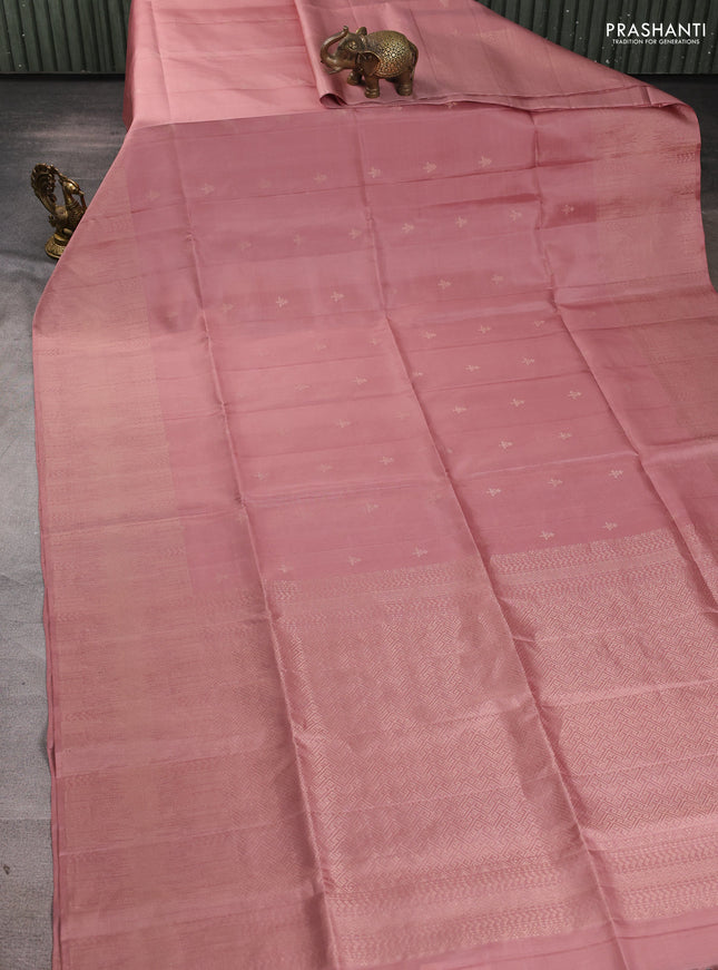 Pure soft silk saree pastel peach with zari woven buttas and rich zari woven border