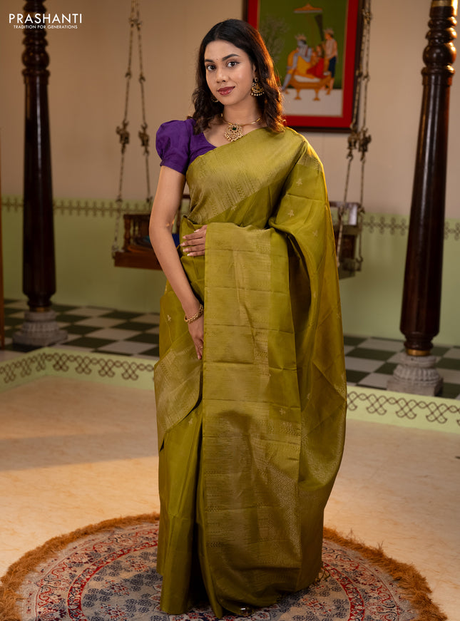 Pure soft silk saree mehendi green with zari woven buttas and rich zari woven border