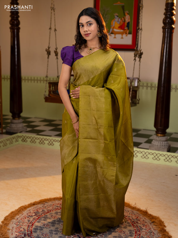 Pure soft silk saree mehendi green with zari woven buttas and rich zari woven border