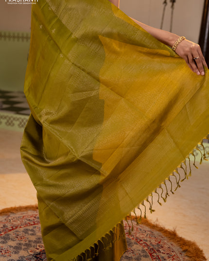 Pure soft silk saree mehendi green with zari woven buttas and rich zari woven border
