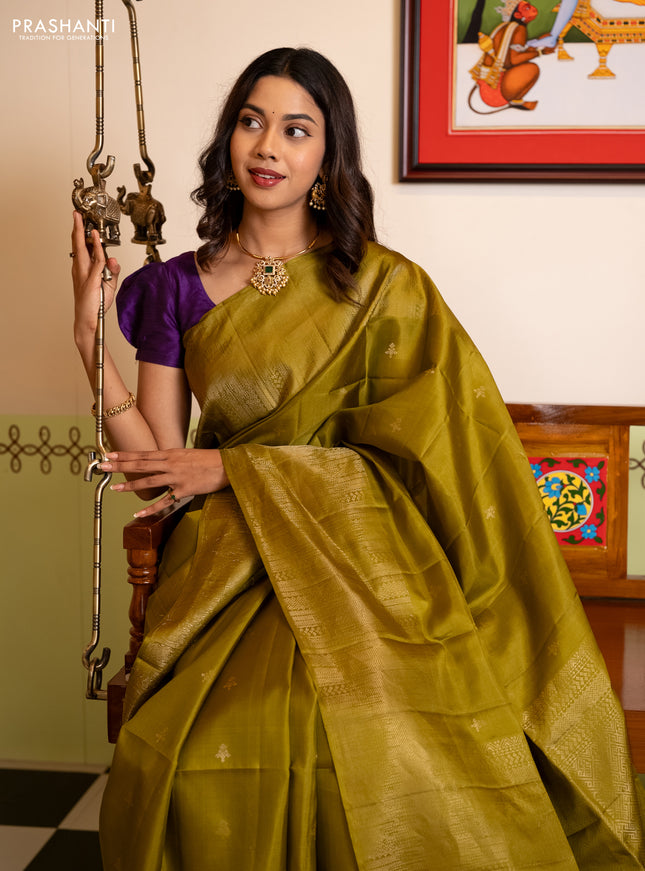 Pure soft silk saree mehendi green with zari woven buttas and rich zari woven border