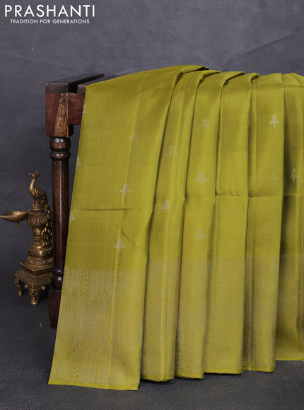 Pure soft silk saree mehendi green with zari woven buttas and rich zari woven border