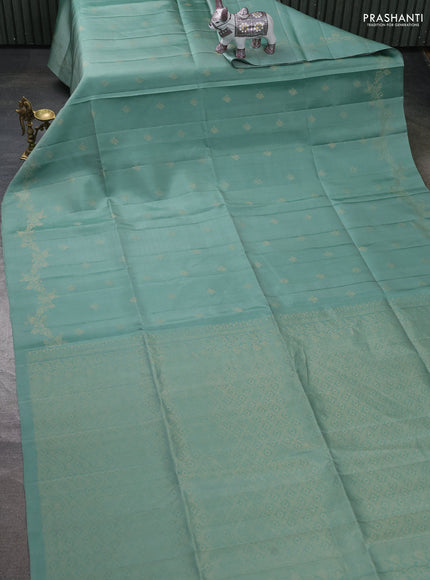 Pure soft silk saree pastel green with zari woven buttas and zari woven border