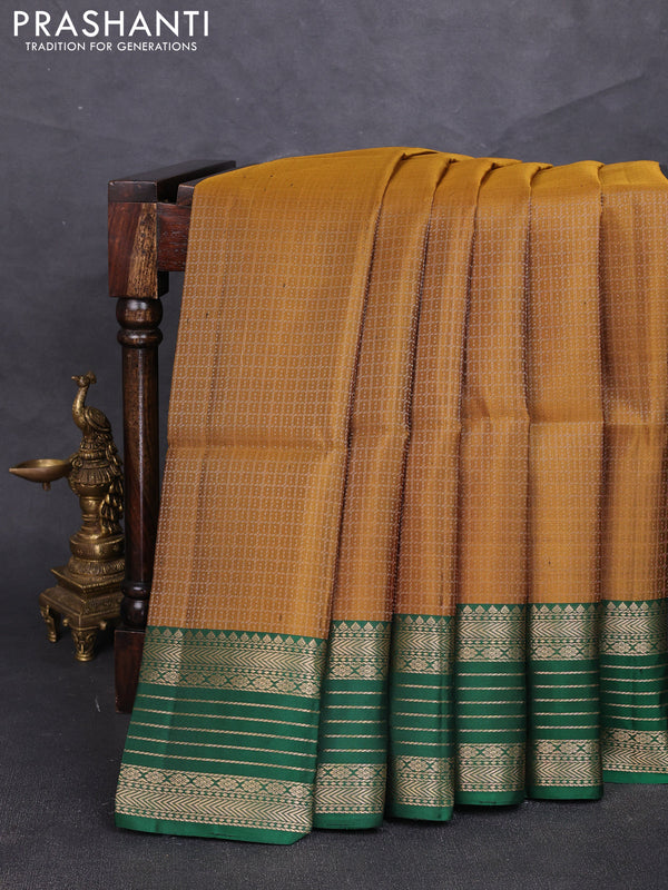 Pure soft silk saree mustard yellow and green with allover laksha deepam pattern and zari woven border