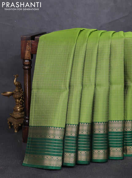 Pure soft silk saree mehendi green and green with allover laksha deepam pattern and zari woven border