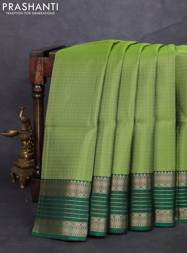 Pure soft silk saree mehendi green and green with allover laksha deepam pattern and zari woven border
