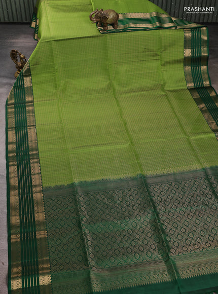 Pure soft silk saree mehendi green and green with allover laksha deepam pattern and zari woven border