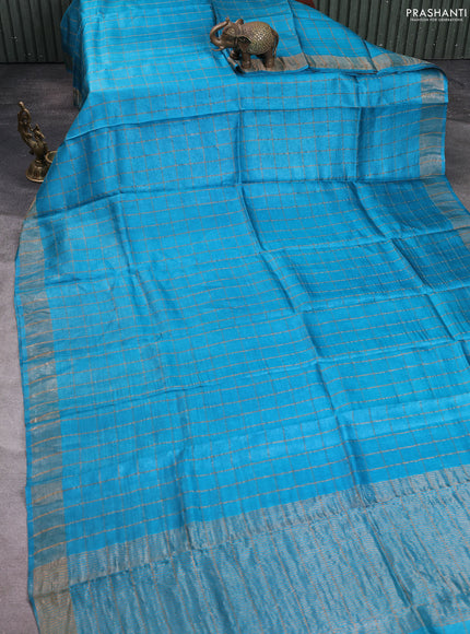 Pure tussar silk saree cs blue and elephant grey with allover zari checked pattern and zari woven border