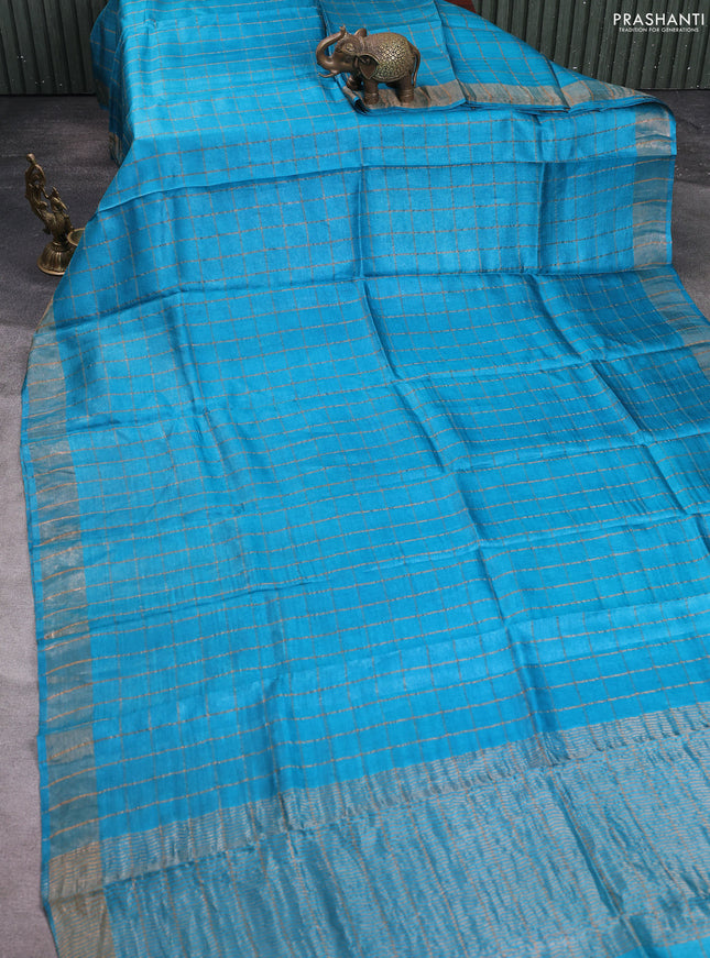 Pure tussar silk saree cs blue and elephant grey with allover zari checked pattern and zari woven border