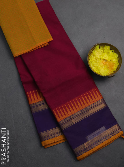 Chettinad cotton saree dark pink and mustard yellow with plain body and temple design rettapet zari woven border
