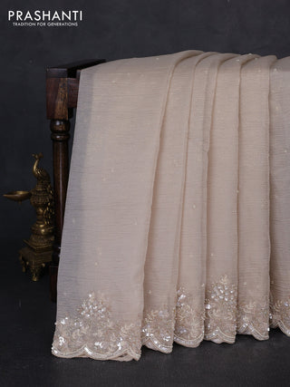 Crush tissue saree beige with beaded work buttas and sequin & beaded embroidery pallu & border