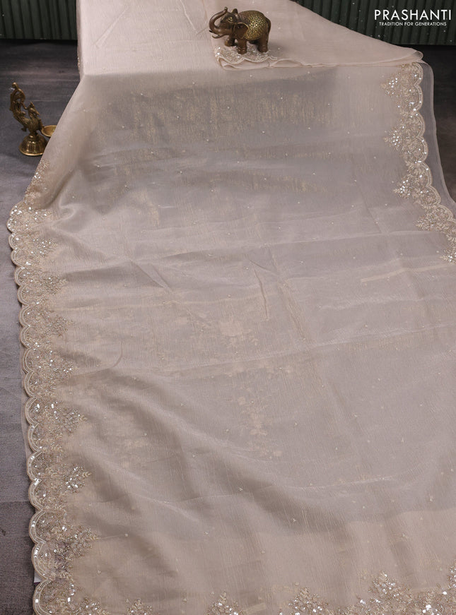 Crush tissue saree beige with beaded work buttas and sequin & beaded embroidery pallu & border