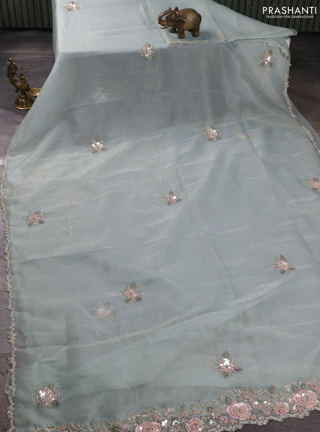 Crush tissue saree teal blue with floral sequin embroidery buttas and beaded work border