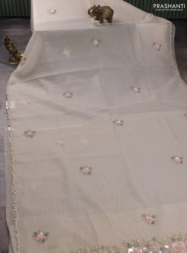 Crush tissue saree beige with floral sequin embroidery buttas and beaded work border
