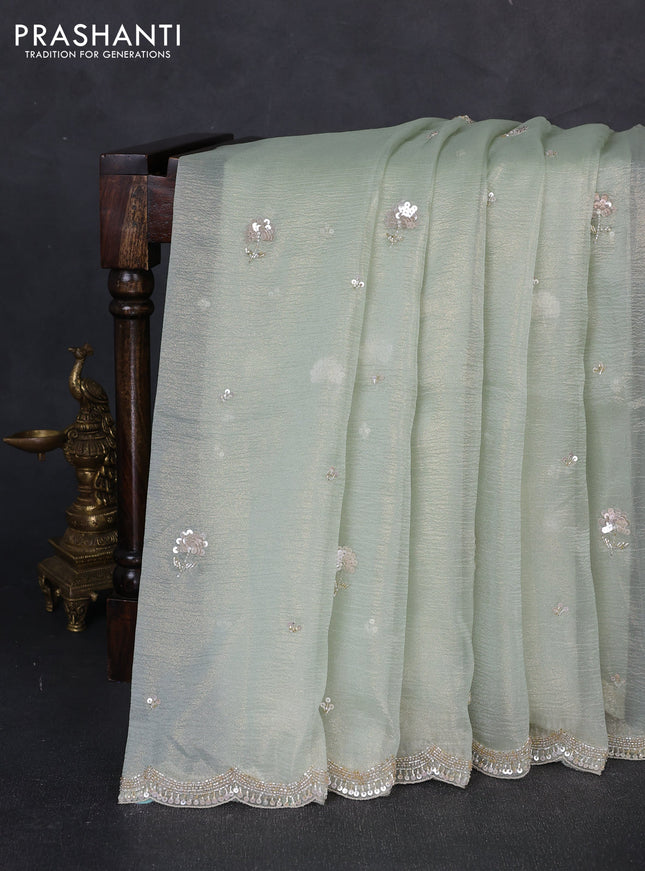 Crush tissue saree pista green with sequin embroidery buttas and sequin embroidery pallu & border