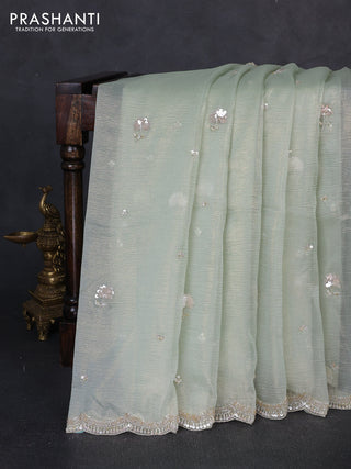 Crush tissue saree pista green with sequin embroidery buttas and sequin embroidery pallu & border
