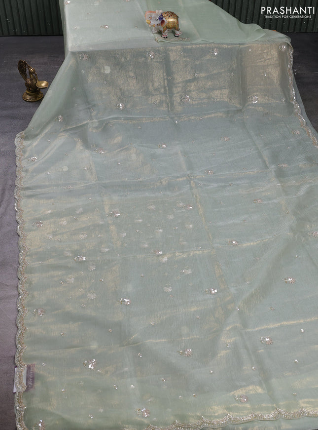 Crush tissue saree pista green with sequin embroidery buttas and sequin embroidery pallu & border