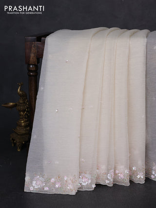 Crush tissue saree cream with sequin embroidery buttas and floral sequin embroidery pallu & border