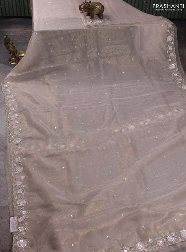 Crush tissue saree beige with sequin embroidery buttas and floral sequin embroidery pallu & border